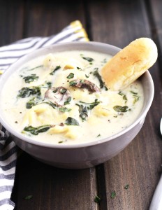 This Slow Cooker Tortellini Soup is so easy to throw together on a weeknight. Spinach and mushrooms go perfectly with this creamy delight.