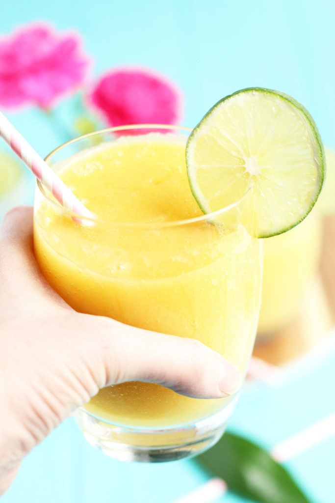 These Frozen Mango Margaritas are perfect for spring with fresh mangos, golden Tequila, and orange juice.  Talk about refreshing...I am getting thirsty just looking at them.  