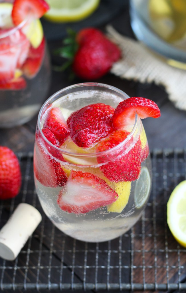 This Strawberry Lemon White Wine Sangria would be perfect for when having company this spring!  The infusion of fresh strawberry and lemon flavors with white wine is so refreshing and delicious. 