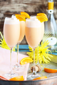 Pineapple Juice, orange sherbert and sparkling moscato are blended together for the ultimate brunch cocktail.