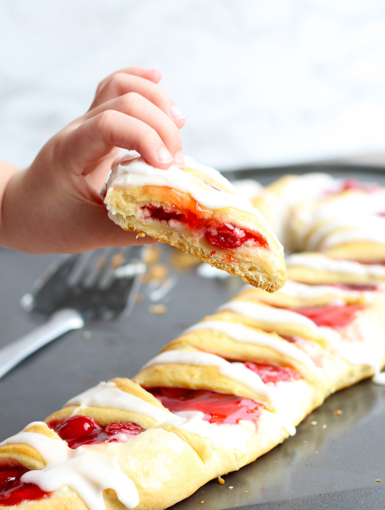 Add a festive Candy Cane Crescent Roll Breakfast Pastry with a cream cheese and cherry filling to your Christmas brunch.  It is sure to impress with minimal effort for a breezy Christmas treat. 