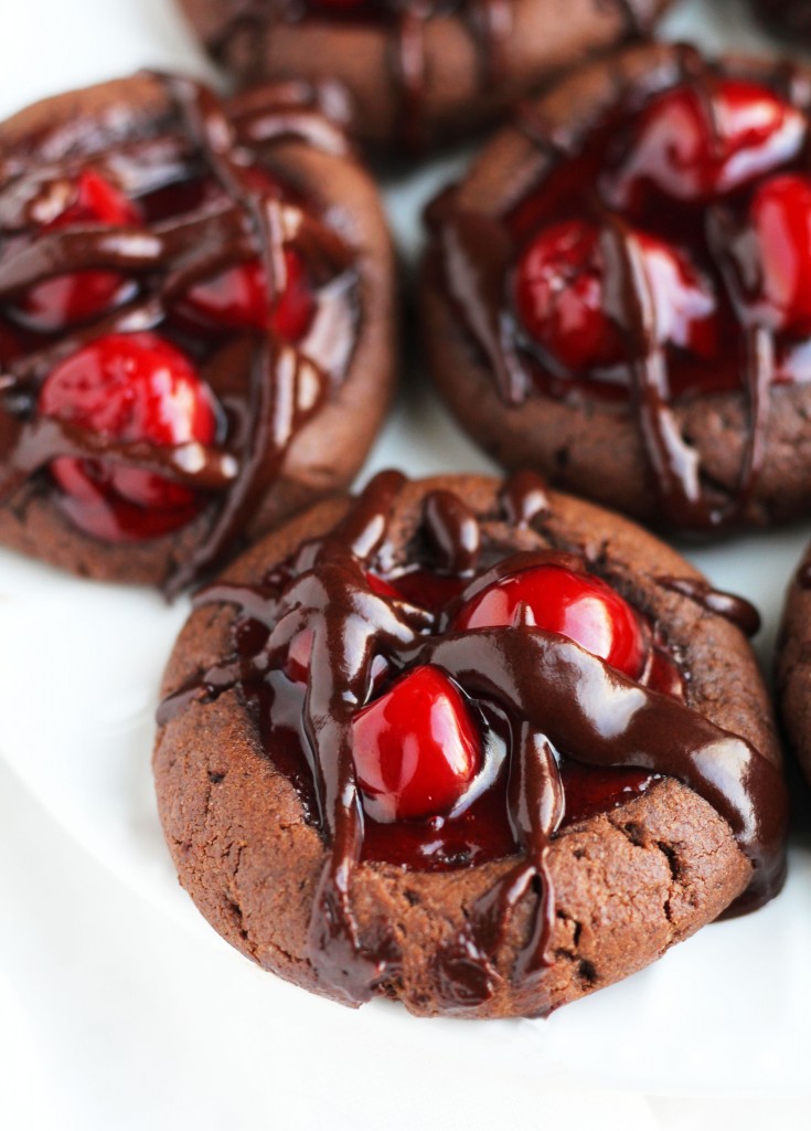 These Chocolate Cherry Thumbprint cookies are the perfect balance of soft and chewy with a delectable chocolate glaze topping!