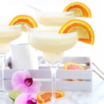 A frozen, Orange Creamsicle Margarita is a refreshing blend of cream, orange and lime juices.