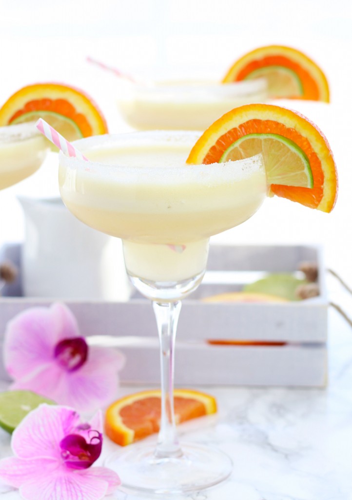 A frozen, Orange Creamsicle Margarita is a refreshing blend of cream, orange and lime juices.