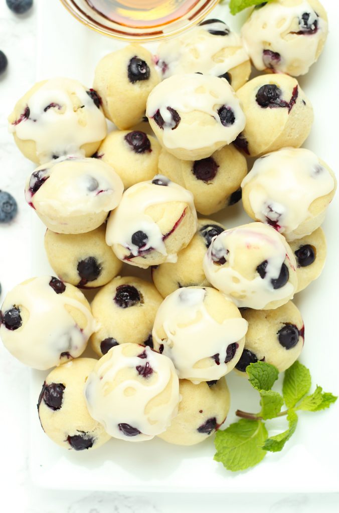 These Blueberry Pancake Bites with a maple glaze are the perfect grab-and-go breakfast for busy mornings.