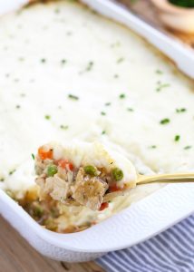 This Leftover Turkey Shepherd's Pie is a great way to use up all your Thanksgiving leftovers!  Carrots, celery and peas get simmered in a gravy sauce and baked with a topping of mashed potatoes.