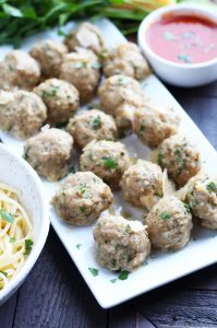 These Baked Turkey Meatballs are a great, healthier alternative with minimal prep time.  Plenty of Parmesan cheese, Panko breadcrumbs and seasoning make these a flavorful meal that can be served with zoodles or noodles.  Freeze any leftovers for a quick weeknight meal!