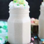 This Boozy Lucky Charms Shake with Baileys will start your St. Patrick's Day off right. A blend of vanilla yogurt, cereal, Baileys and vanilla vodka with a marshmallow topping makes a festive adult treat.