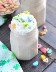This Boozy Lucky Charms Shake with Baileys will start your St. Patrick's Day off right. A blend of vanilla yogurt, cereal, Baileys and vanilla vodka with a marshmallow topping makes a festive adult treat.