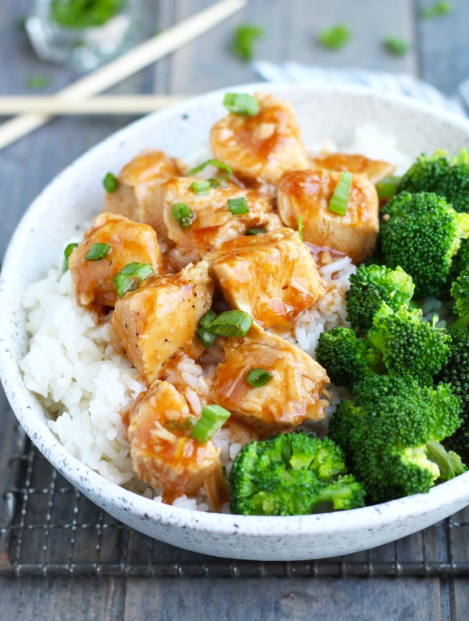 This Crockpot Orange Chicken is super easy to make with barbecue sauce, orange marmalade, soy sauce and orange juice.  It is part of my weekly dinner rotation and popular with the kids.  Serve it in a bowl over rice or stir-fried noodles with veggies for a complete meal.