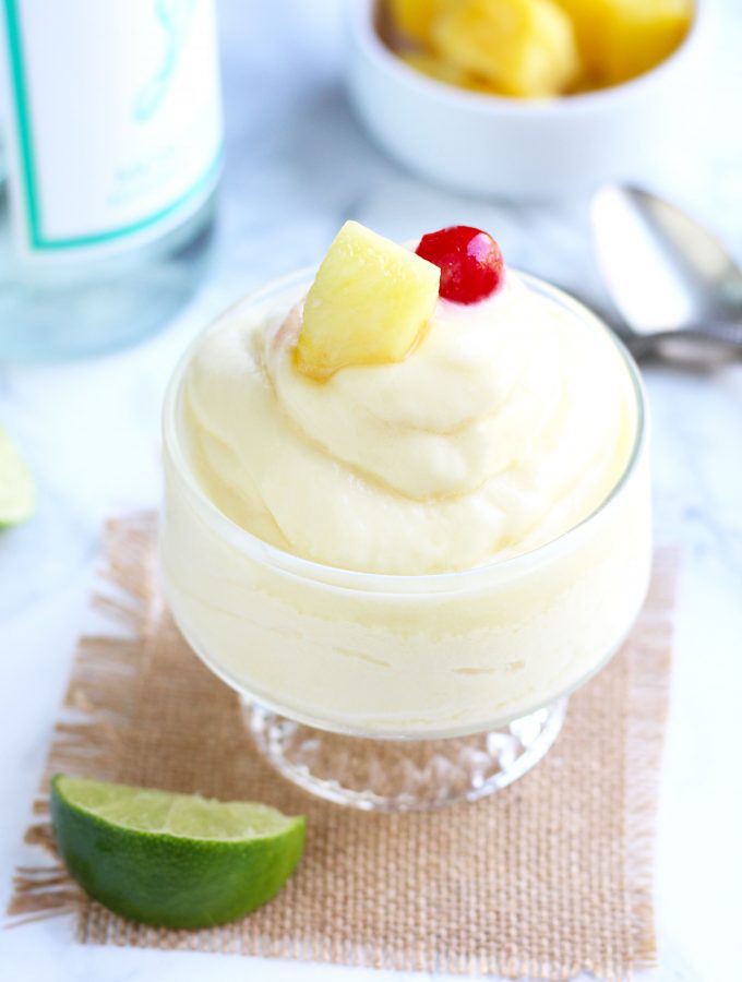 A Moscato Dole Whip will be your new favorite boozy dessert this summer.  Vanilla ice cream gets blended with frozen pineapples, pineapple juice, lime juice and your favorite, Moscato wine.