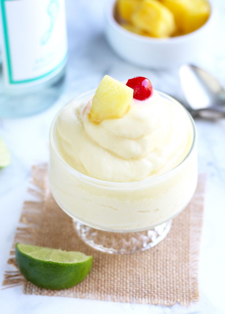 A Moscato Dole Whip will be your new favorite boozy dessert this summer.  Vanilla ice cream gets blended with frozen pineapples, pineapple juice, lime juice and your favorite, Moscato wine.