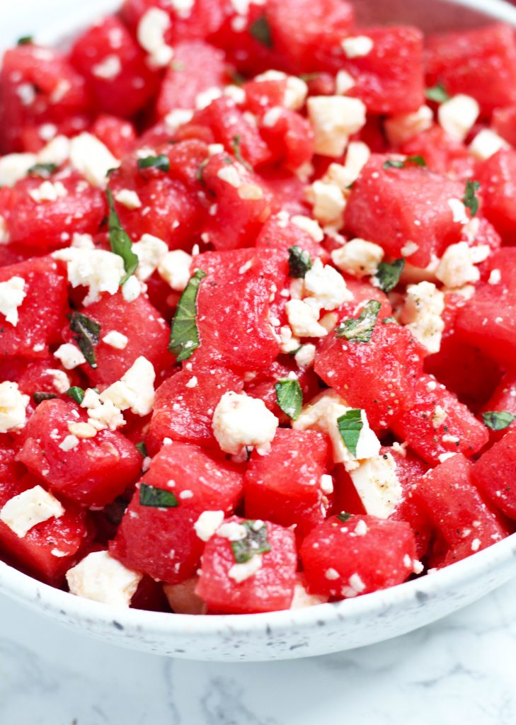 This Watermelon Salad with Feta and Mint is simple and refreshing for hot summer days.Â  A bit of honey and lime adds to the sweet, watermelon flavors with a topping of feta and fresh mint leaves.