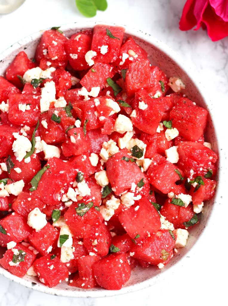 This Watermelon Salad with Feta and Mint is simple and refreshing for hot summer days.Â  A bit of honey and lime adds to the sweet, watermelon flavors with a topping of feta and fresh mint leaves.