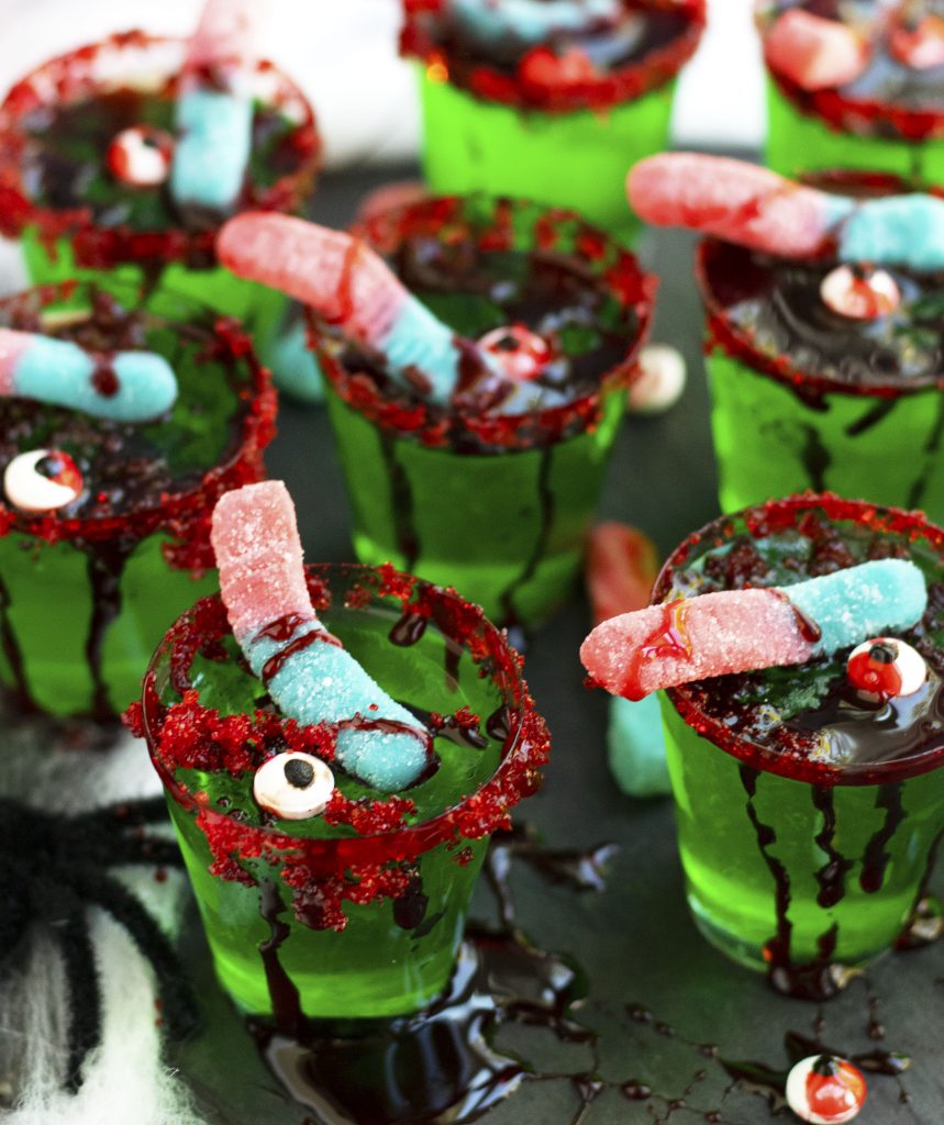 These Zombie Brain Margarita Jello shots with triple sec, lime juice, lime-flavored Jello and gold tequila are perfect for Halloween parties.  Top these little treats off with fake blood, gummy worms and a red sugared rim for a spooky effect.  