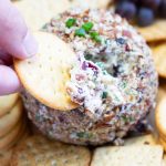This Cranberry Pecan Cheese Ball is so festive for the holidays and easily made with only 5 ingredients.  Make it the day before for a worry-free holiday celebration.  Serve it with your favorite crackers, pretzels or veggies.