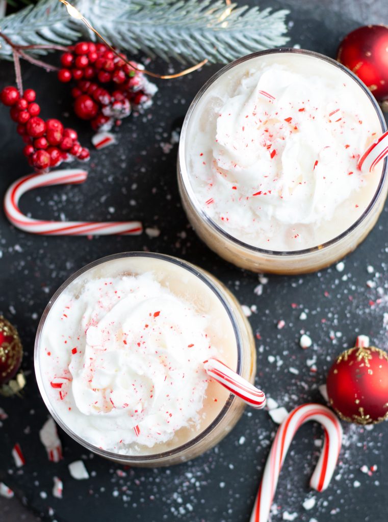 This Peppermint White Russian is perfect for entertaining during the holidays with Peppermint Vodka, Kahlua and Half & Half.  Add whipped cream and crushed candy canes for a festive topping.