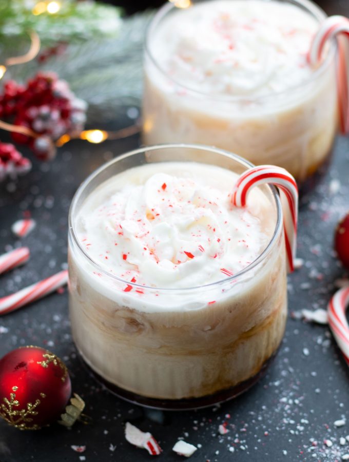 This Peppermint White Russian is perfect for the holidays with Peppermint Vodka, Kahlua and cream. Top if with whipped cream and crushed candy canes for a festive addition.